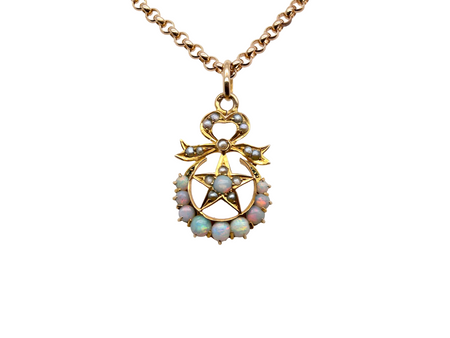 A beautiful antique Victorian pendant featuring opals and pearls.