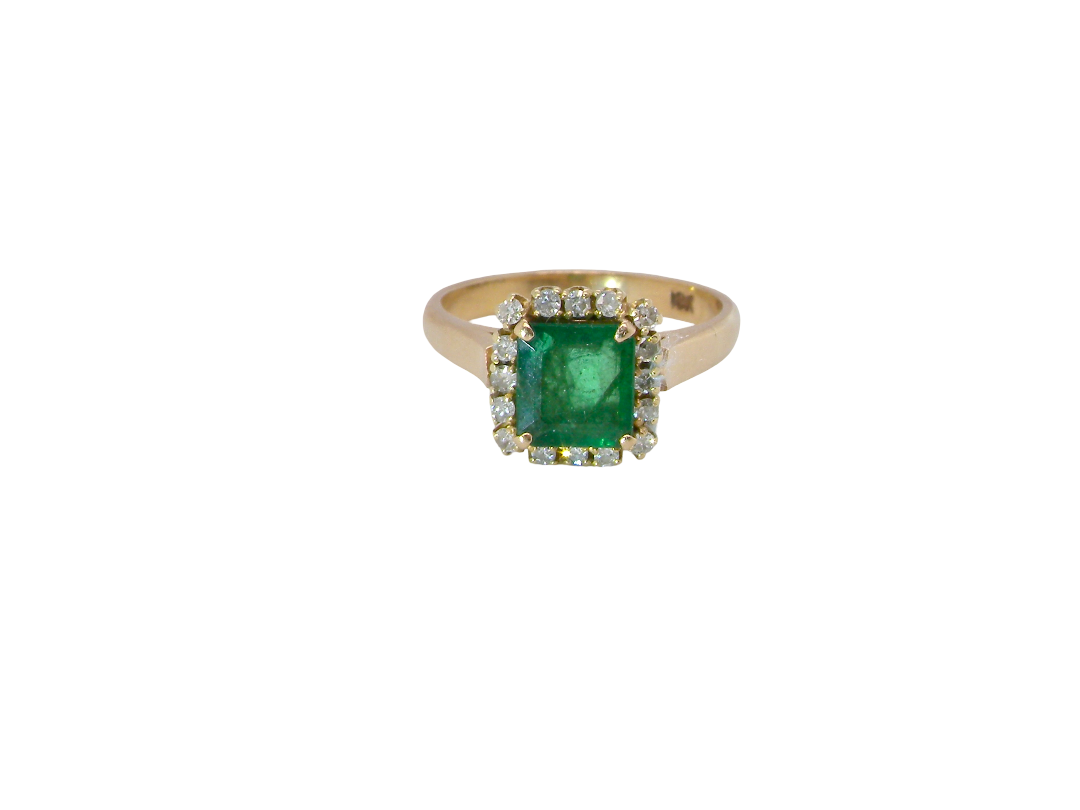 A beautiful cluster ring set with a large square-cut emerald measuring approximately 7 x 7mm, displaying a deep grass-green colour with natural inclusions, 
