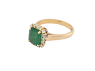 A beautiful cluster ring set with a large square-cut emerald measuring approximately 7 x 7mm, displaying a deep grass-green colour with natural inclusions, as expected in emeralds. side