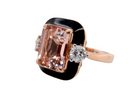 A beautiful dress ring that features a pink sherry coloured morganite gemstone, 12.5x9.7mm (4.19 carats) in a rim setting.