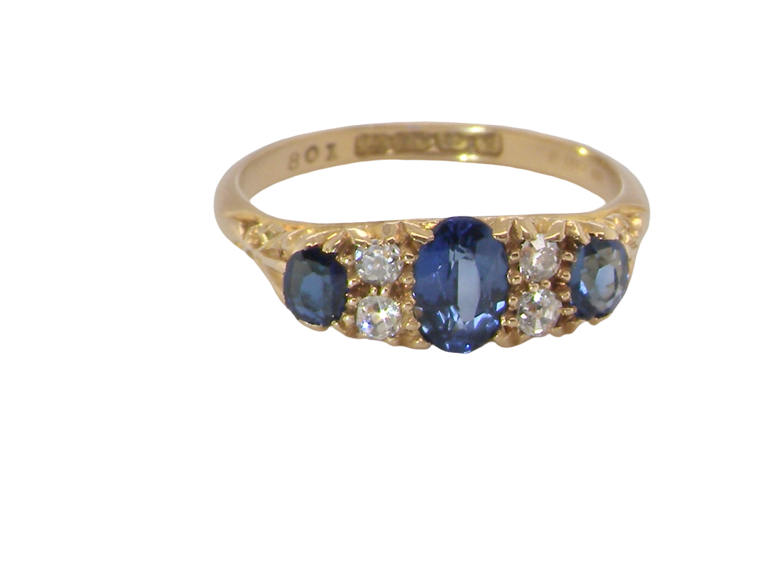A beautiful&nbsp;Edwardian sapphire and diamond ring, dating to 1907, crafted in 18 carat gold with a traditional hand-carved boat-shaped setting. 