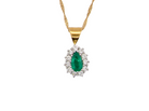 A beautiful pear shaped pendant. The emerald measures 7x5mm (0.75 carats est), good deep grass green colour.