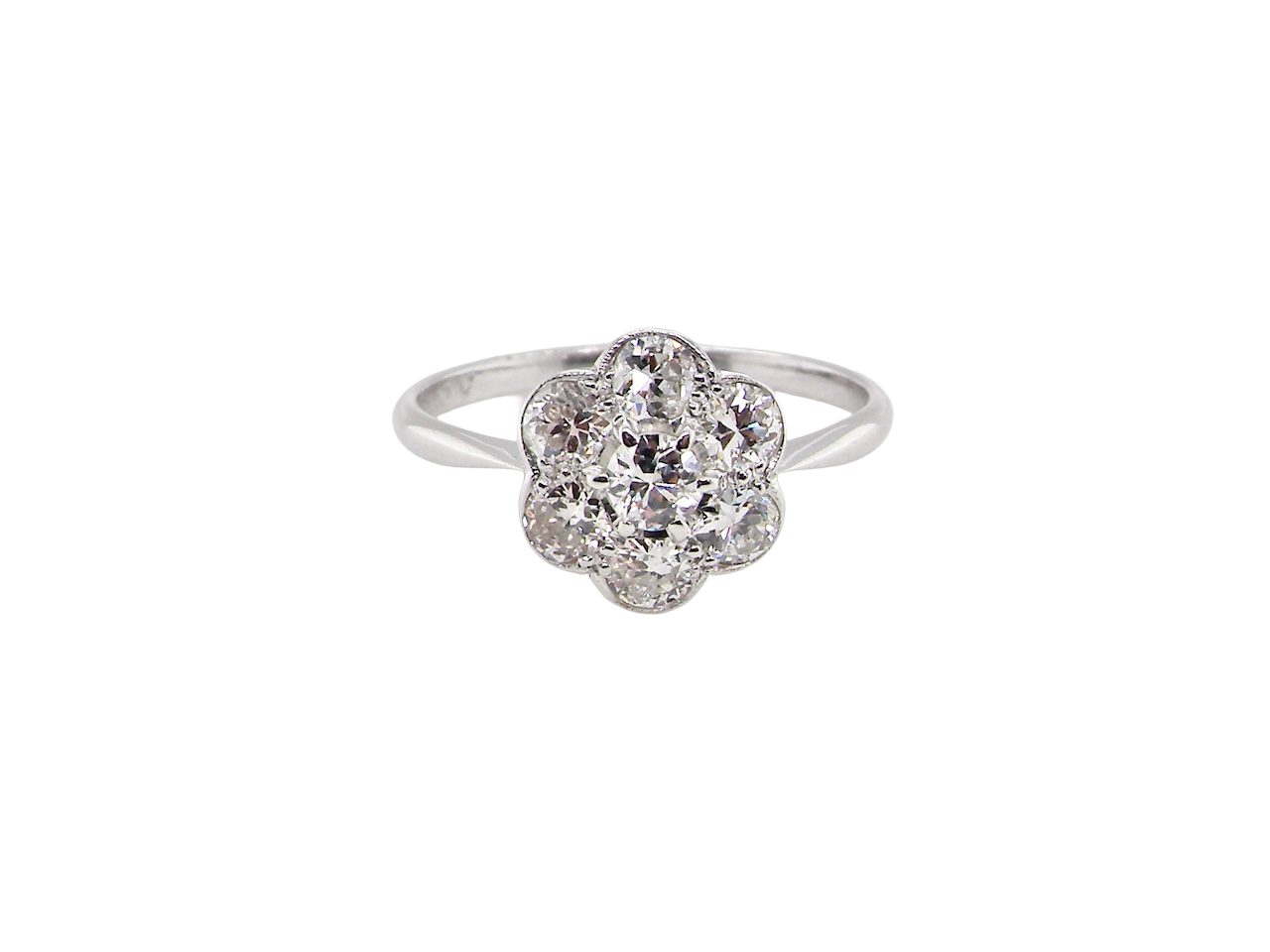 Diamond ring with floral design on a white background