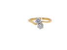 A beautifully balanced Moi et Toi ring featuring two sparkling modern brilliant-cut diamonds