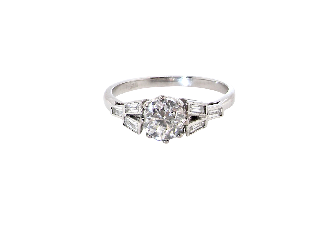 A beautifully proportioned Art Deco solitaire ring showcasing a sparkling old brilliant cut white diamond