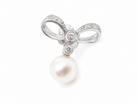 A bow design that has small diamonds to each side and the centre of the bow 
