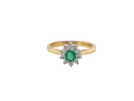 A classic Emerald and Diamond cluster ring