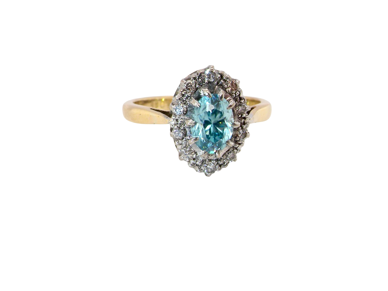 A cluster ring set with a natural blue zircon centre stone, 7.5x5mm, aquamarine colour.&nbsp;
