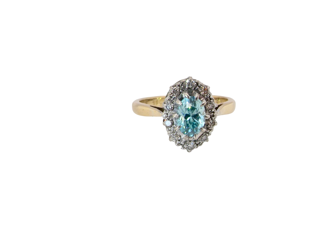 A cluster ring set with a natural blue zircon centre stone, 7.5x5mm, vibrant aquamarine colour.&nbsp;
