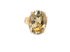 A continental dress ring that tests as 18 carat gold. Features a large citrine gemstone, that measures 18x13mm, depth 9mm. Golden yellow with a hint of olive green.&nbsp;
