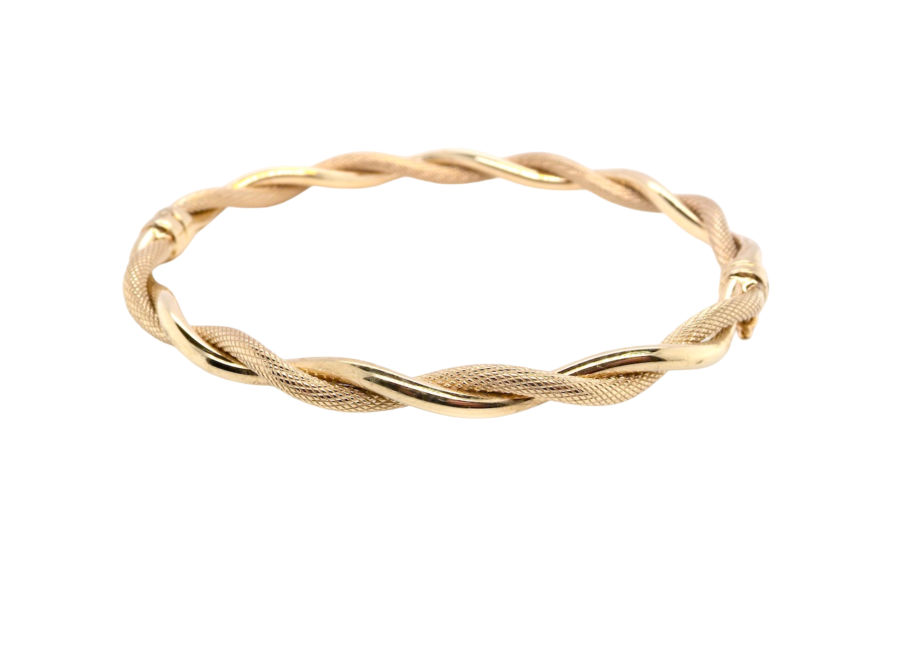 A double twist of a plain band entwined around a filagree band to add strength and beauty to this very wearable piece of jewellery.
