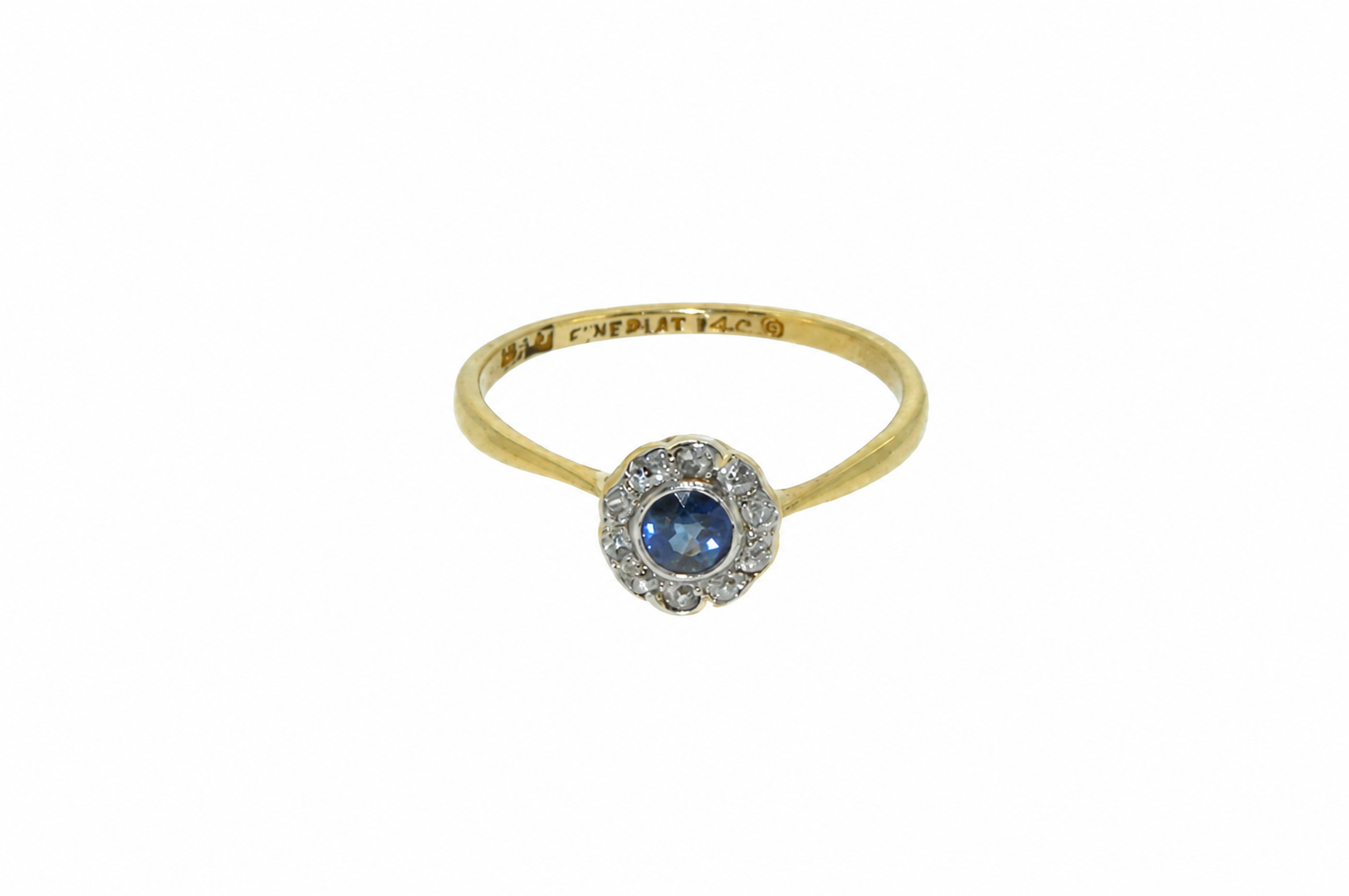 A vintage sapphire and diamond cluster ring