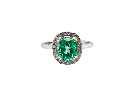 A fabulous Emerald and Diamond Cluster Ring