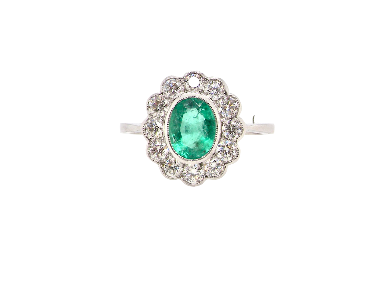 A fabulous Emerald and Diamond cluster ring
