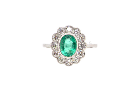 A fabulous Emerald and Diamond cluster ring