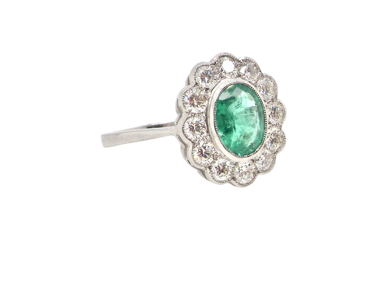 A fabulous Emerald and Diamond cluster ring