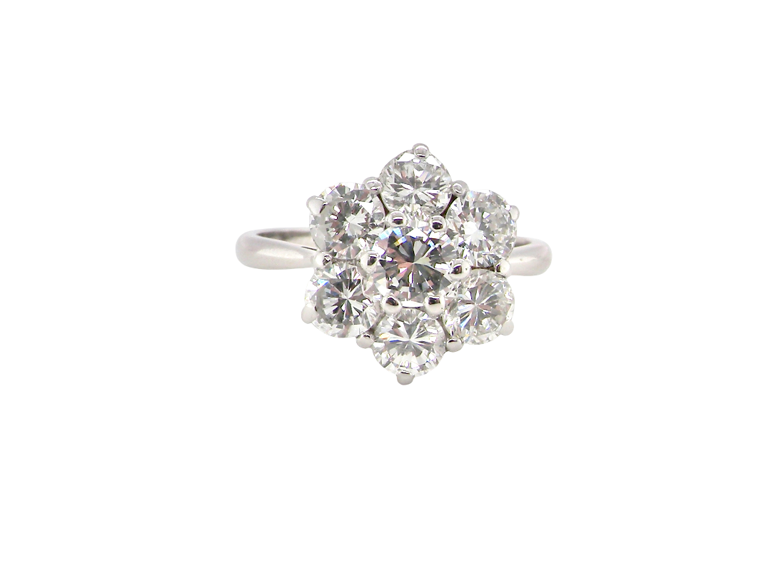 A fabulous vintage diamond cluster ring, beautifully crafted in&nbsp;18 carat white gold and set with seven fine brilliant cut white diamonds.
