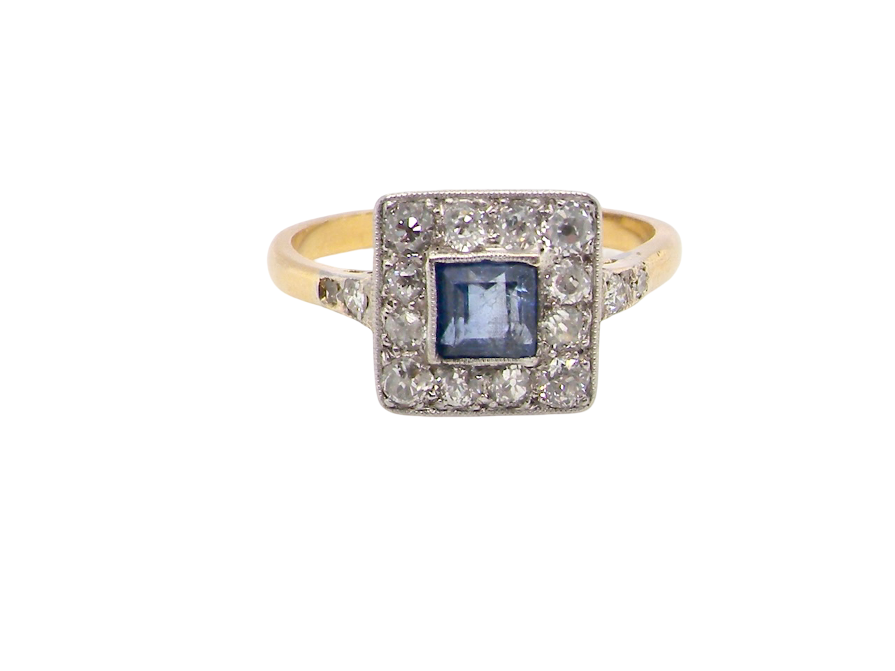 A fine Art Deco cluster ring. The centre stone a square sapphire 5x5mm (est 0.50 carats) in a mille grain setting.
