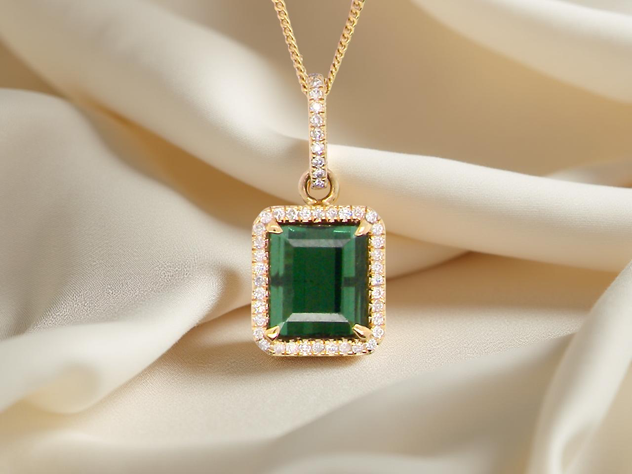 A fine Green Tourmaline and Diamond pendant