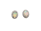 A fine and elegant pair of platinum* stud earrings, each beautifully set with an exceptional white opal measuring 7 x 5mm. T