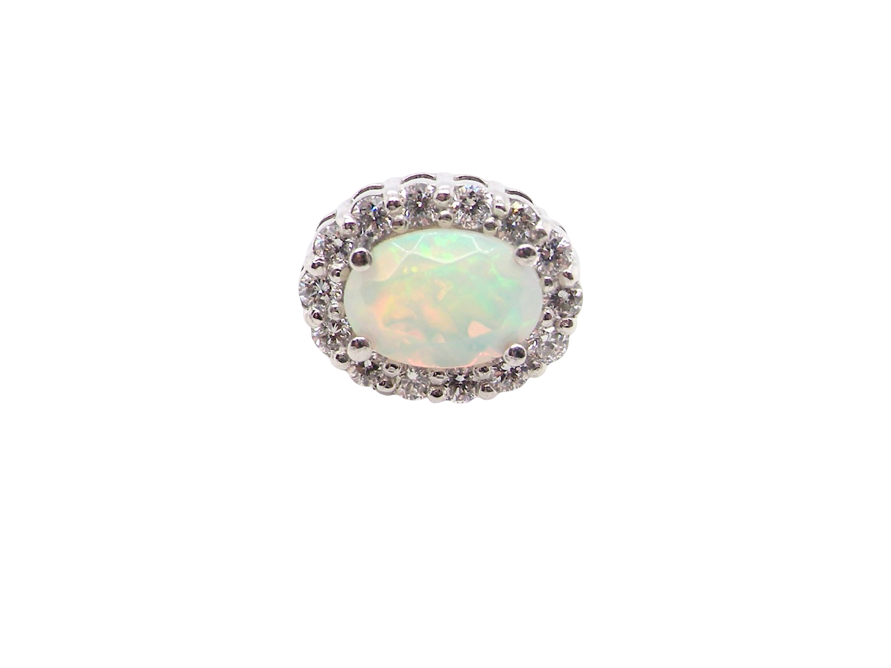 platinum* stud earrings beautifully set with an exceptional white opal measuring 7 x 5mm. T