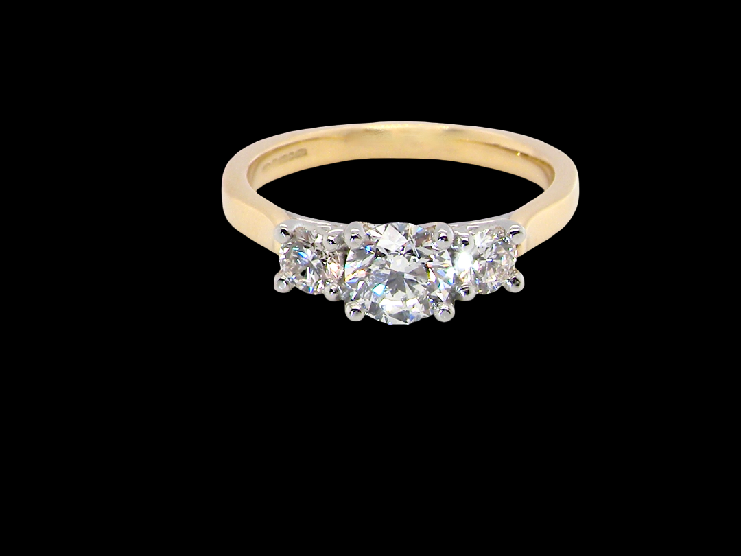 A fine and impressive three stone diamond ring, beautifully set with three graduated brilliant cut white diamonds.