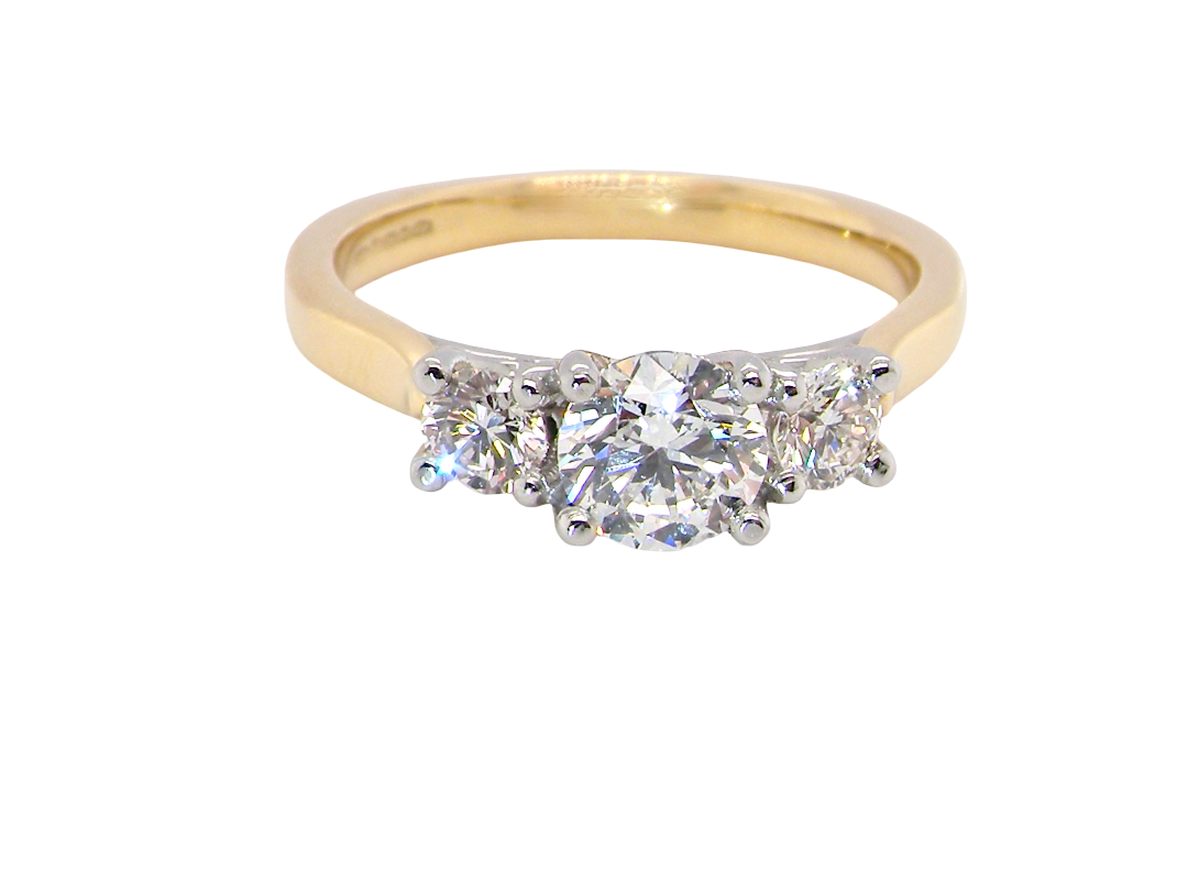 A fine and impressive three stone diamond trilogy ring, beautifully set with three  brilliant cut white diamonds.