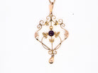 A fine antique pendant. Victorian openwork design, measures 40x30mm.