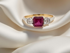 A classic Ruby and Diamond trilogy ring