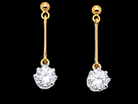 A fine pair of 18 carat yellow gold drop earrings.

Each modern brilliant cut white diamond measures 5mm (est half a carat each), 
