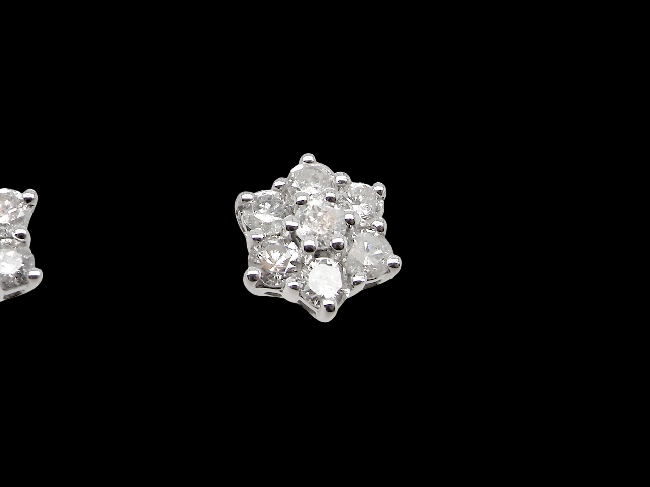 A fine pair of 9 carat white gold diamond stud earrings.&nbsp; A