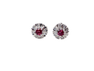 A fine pair of cluster earrings. Features to the centre a round 4.6mm pink sapphire (est 0.38 carats) with a good deep colour hue.