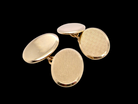 A fine pair of vintage 9 carat gold double cufflinks, both oval in form and measuring approximately&nbsp;20 × 14 mm.