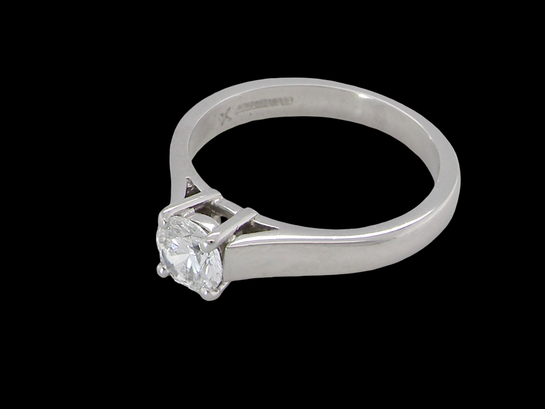 A fine solitaire ring, features an exceptional half carat diamond, brilliant cut, colour H-j, clarity VS2-Si1. Measures 5.2mm, depth 5.5mm, weight 4.9grams
side