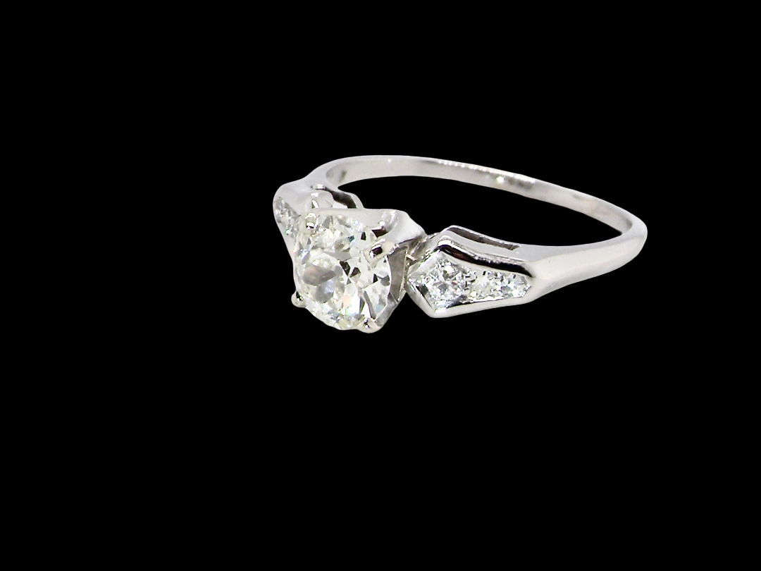 A fine solitaire ring featuring an e lovely brilliant cut white diamond. Measures 6.3mm (est 0.85 carats) very bright white stone, colour H-i, clarity VS. Head depth 7mm.&nbsp;
 side