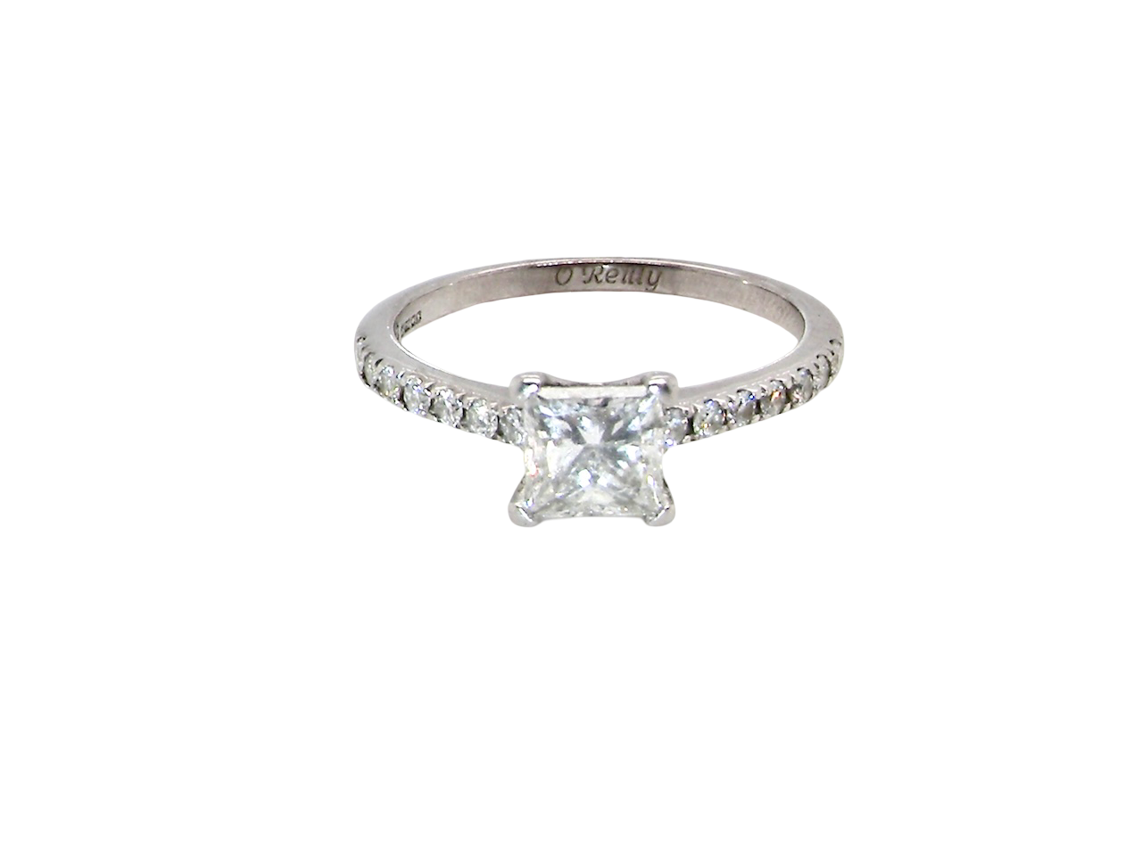 Diamond ring with a clear gemstone on a white background