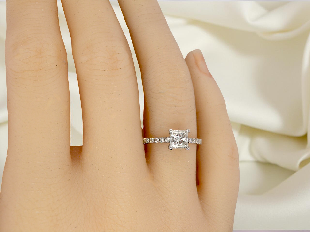 A fine white gold solitaire diamond ring