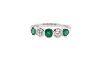 A five stone Emerald and Diamond ring