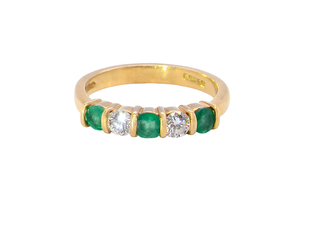 A five stone ring set with three emeralds, each 3mm diameter.

Between each two brilliant cut white diamonds, each 3.4mm (