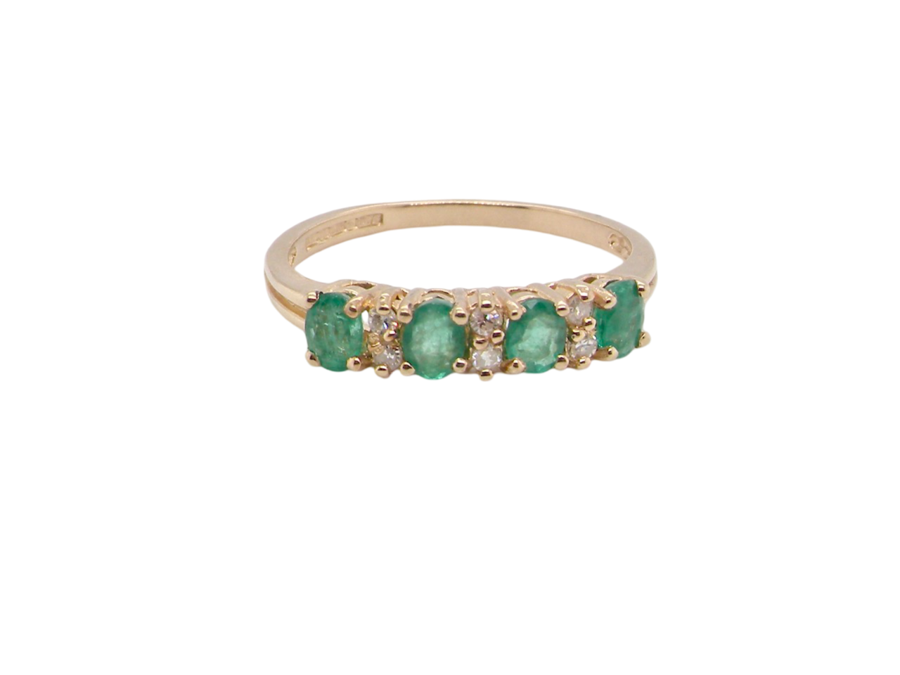 An Emerald and Diamond Ring