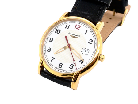A gentleman's gold plated wrist watch by Longines.
