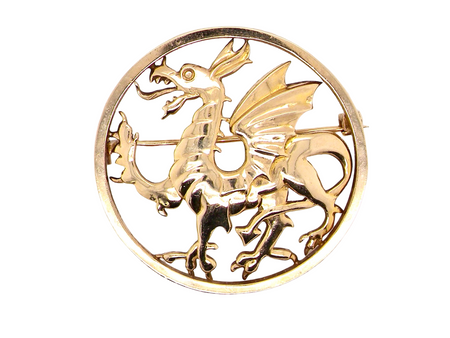 A gold dragon brooch