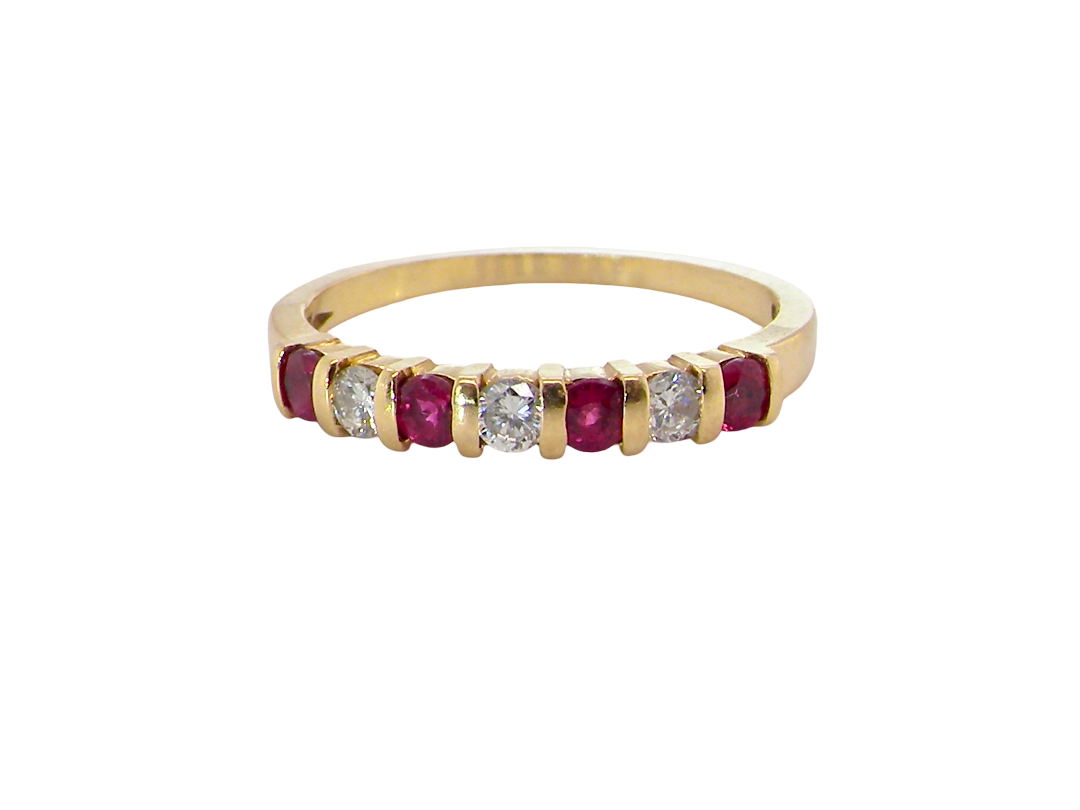 A half hoop 18 carat yellow gold eternity ring. Set with four bright red rubies, each 2.6mm (total carat weight 0.28 est)