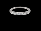 A half hoop eternity ring. Set with eleven small white diamonds, brilliant cut 2mm each (total est 0.33 carats) 