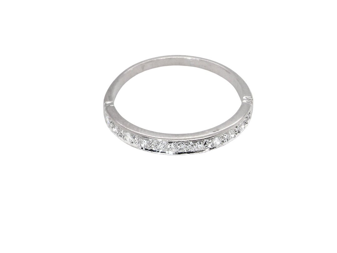 A half hoop eternity ring. Set with eleven small white diamonds, brilliant cut 2mm each (total est 0.33 carats) colour i-k, clarity Si. above