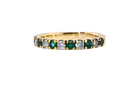 A half hoop eternity ring. Set with seven emeralds,A