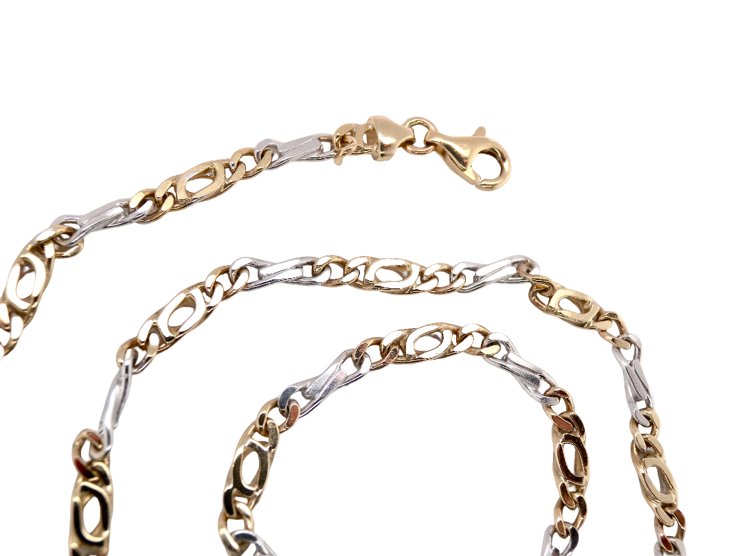 A heavy 9 carat gold neck chain. 2 colour gold, white and yellow