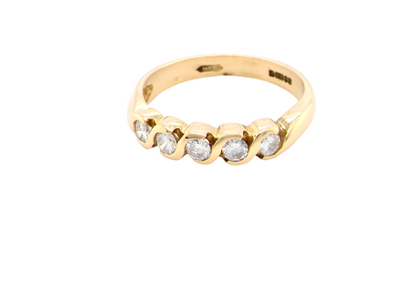 A lazy S 18 carat gold Diamond eternity ring