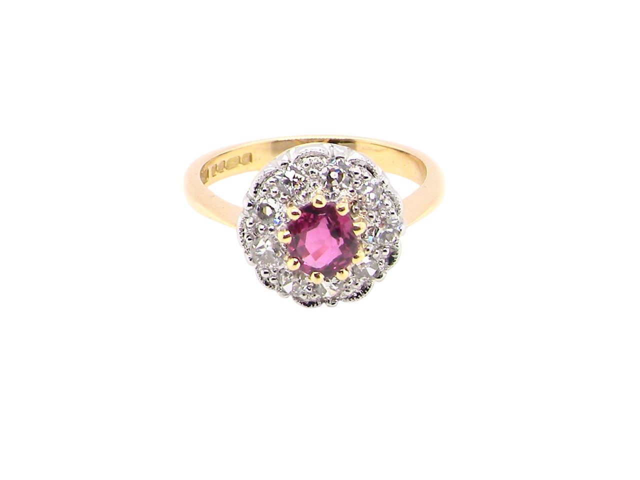 A lovely daisy cluster ring that profiles to the centre a deep red ruby, 5mm (0.50 carats) yellow claw set.
