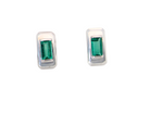 A lovely modern pair of earrings. Each emerald is rectangular, step cut,